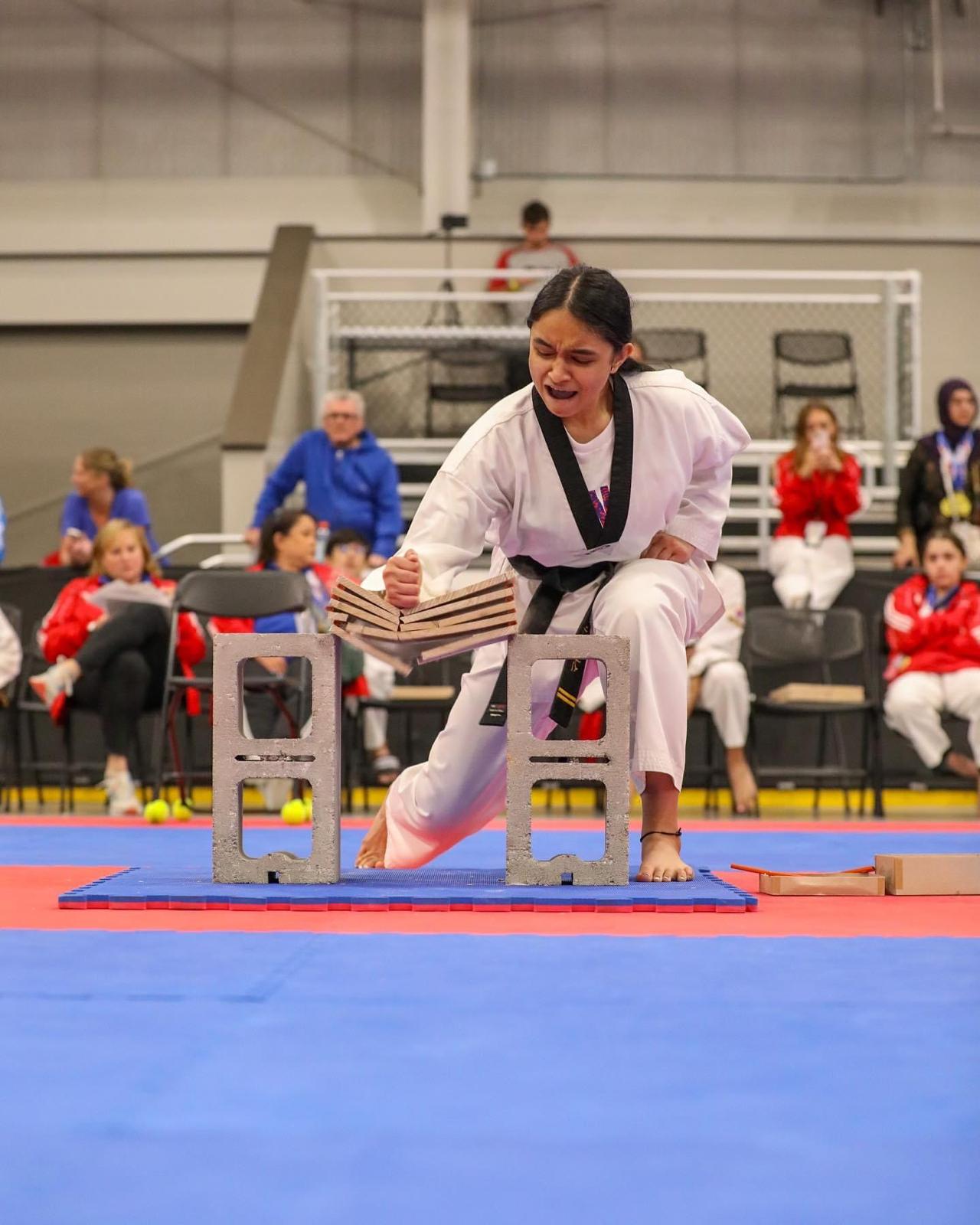 Siona with supporters at a community or martial-arts milestone.